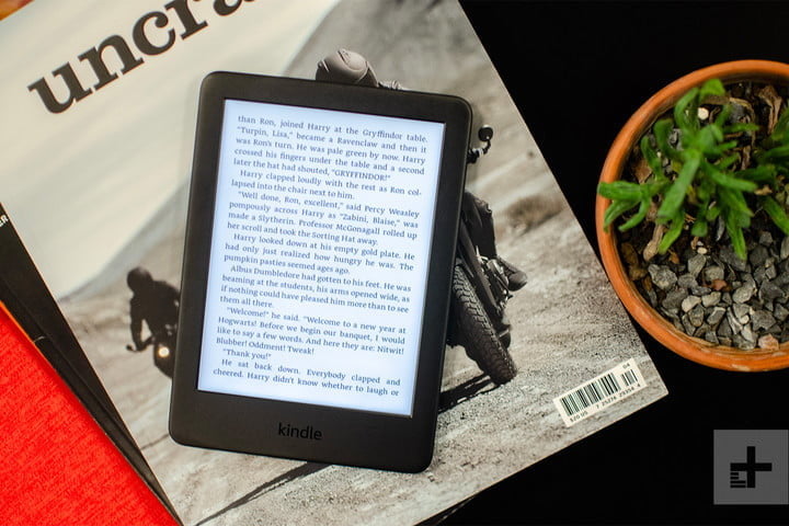 An Amazon Kindle displayed on a coffee table.